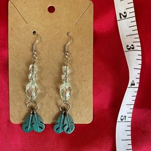 Light blue/green beaded feather charm earrings